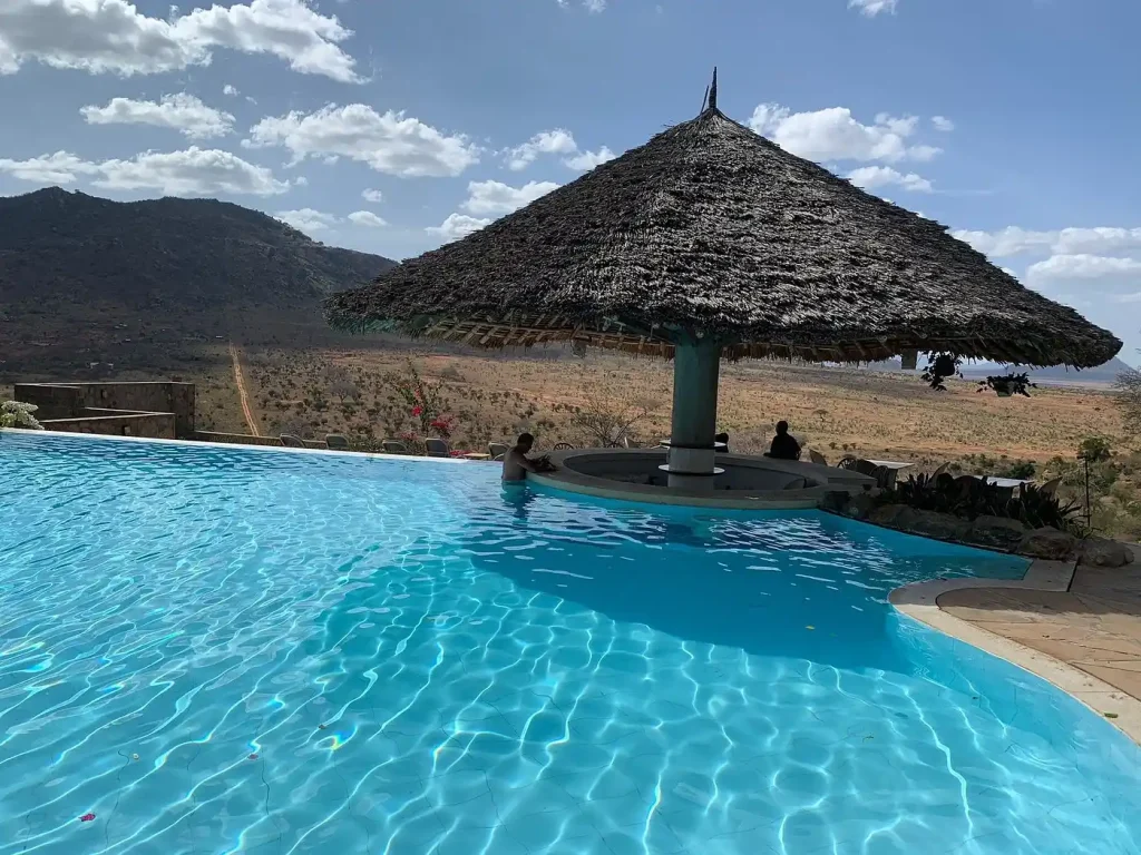 Garden and pool area at Lion Hill Safari Lodge near Voi Gate, Tsavo East National Park